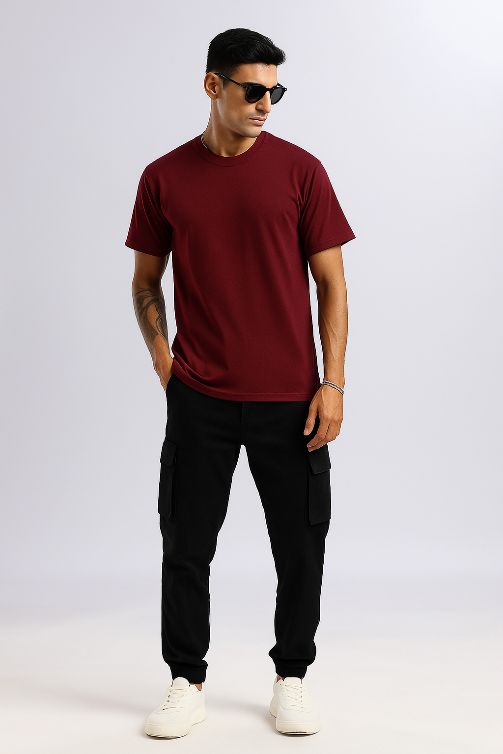 Model wearing Maroon Oversized T-Shirt in lifestyle setting.