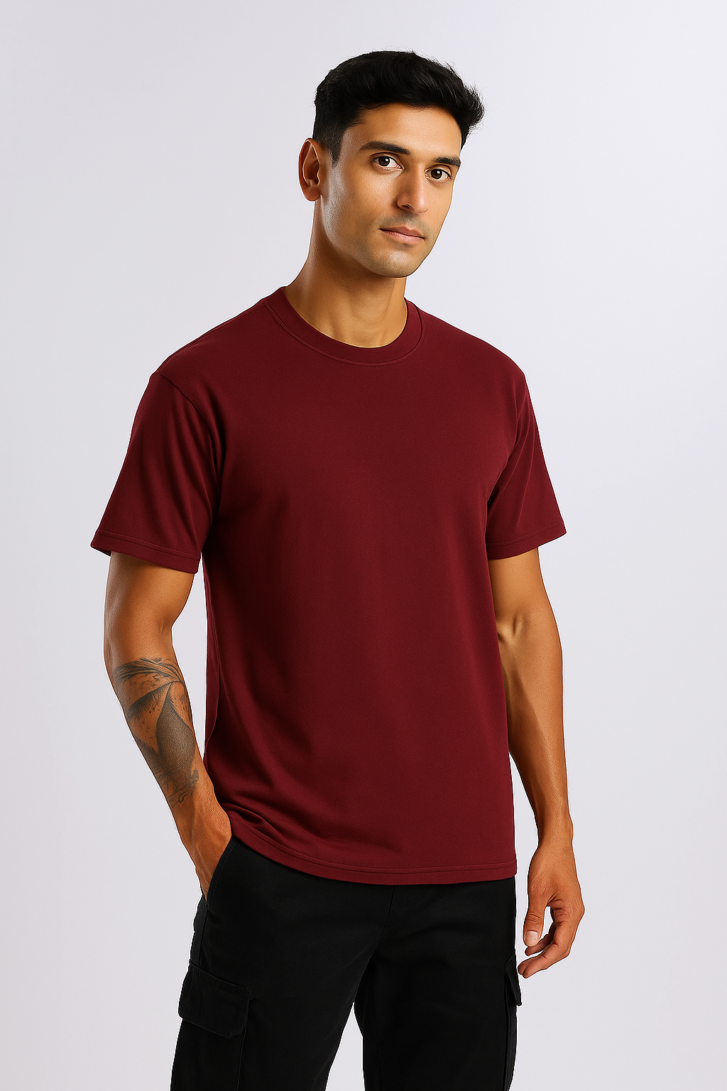 Side profile of Maroon Oversized T-Shirt showcasing dropped shoulder and relaxed silhouette