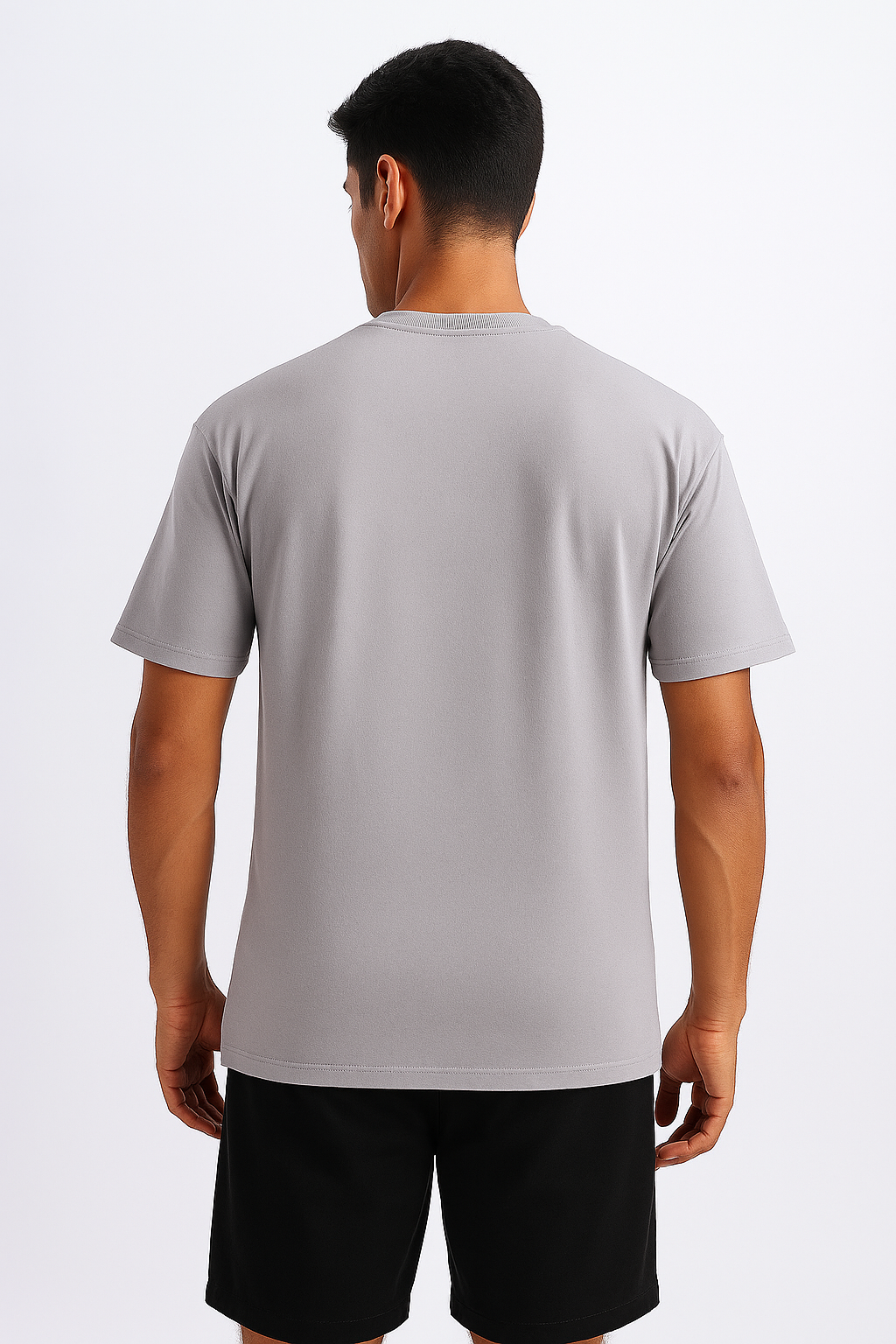 Rear shot of a grey men's tee, emphasizing its smooth, simple design from behind