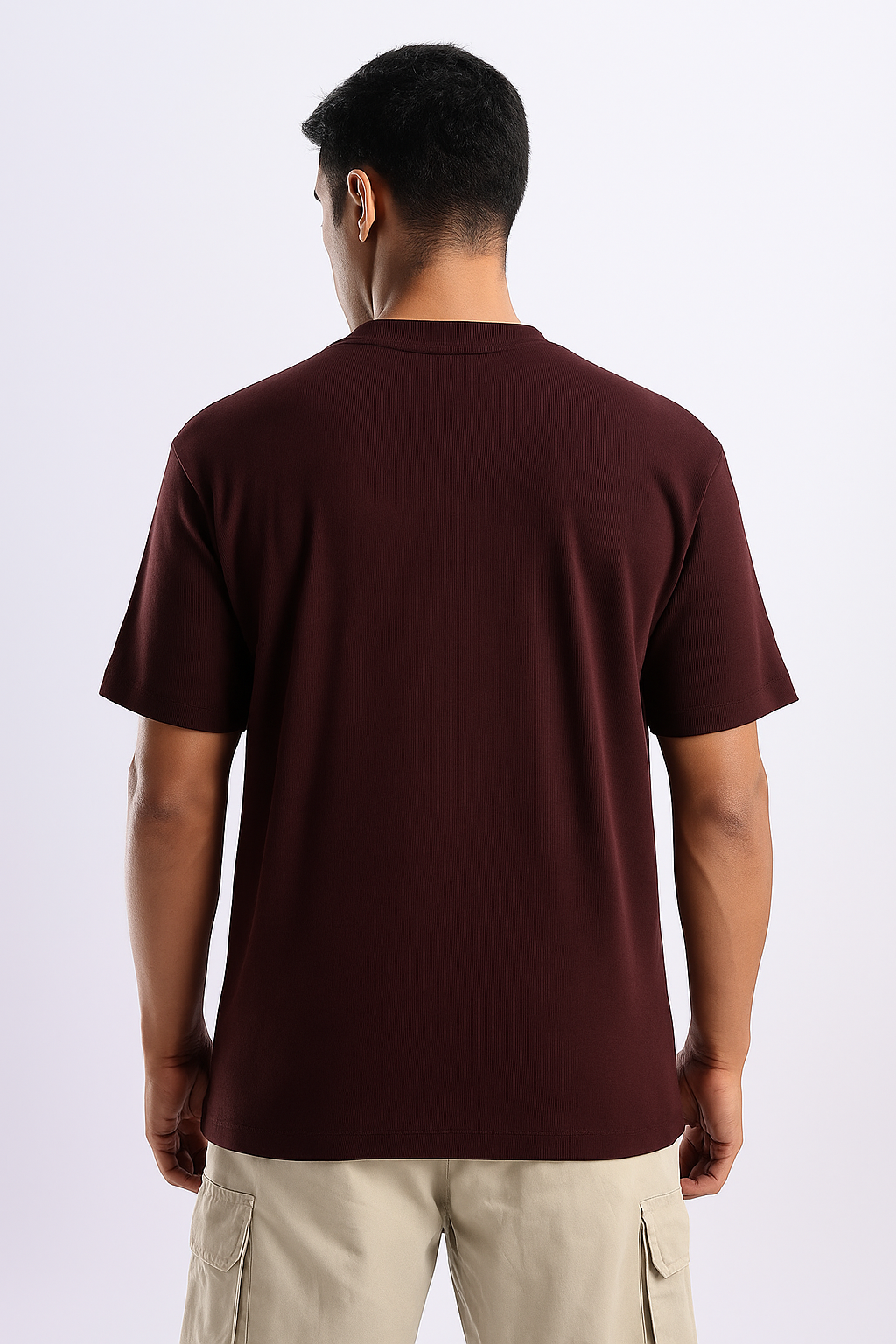 Man wearing a maroon ribbed ultra stretch T-shirt, shown from the back.