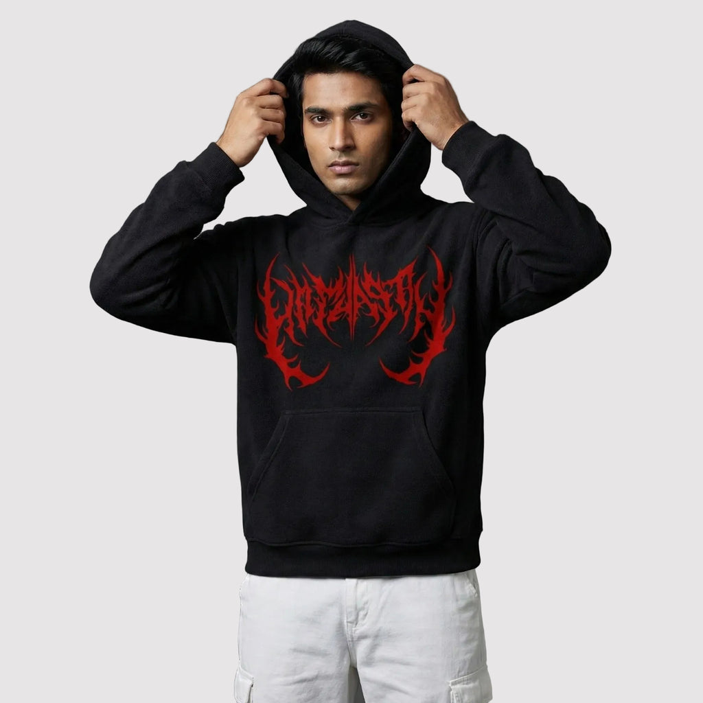 Person wearing a black hoodie with red logo on a gray background
