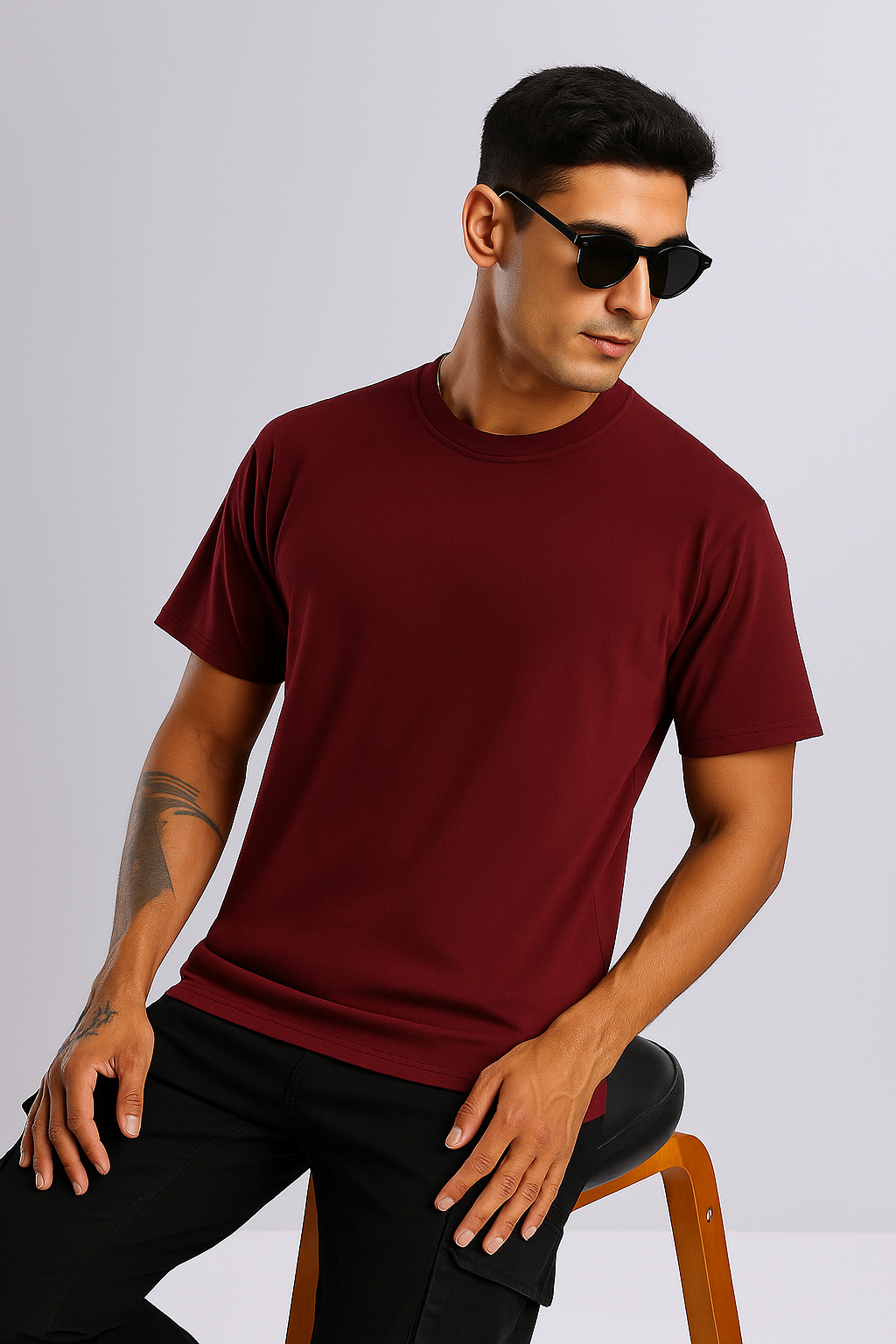 Model wearing Maroon Oversized T-Shirt in lifestyle setting – casual streetwear vibe