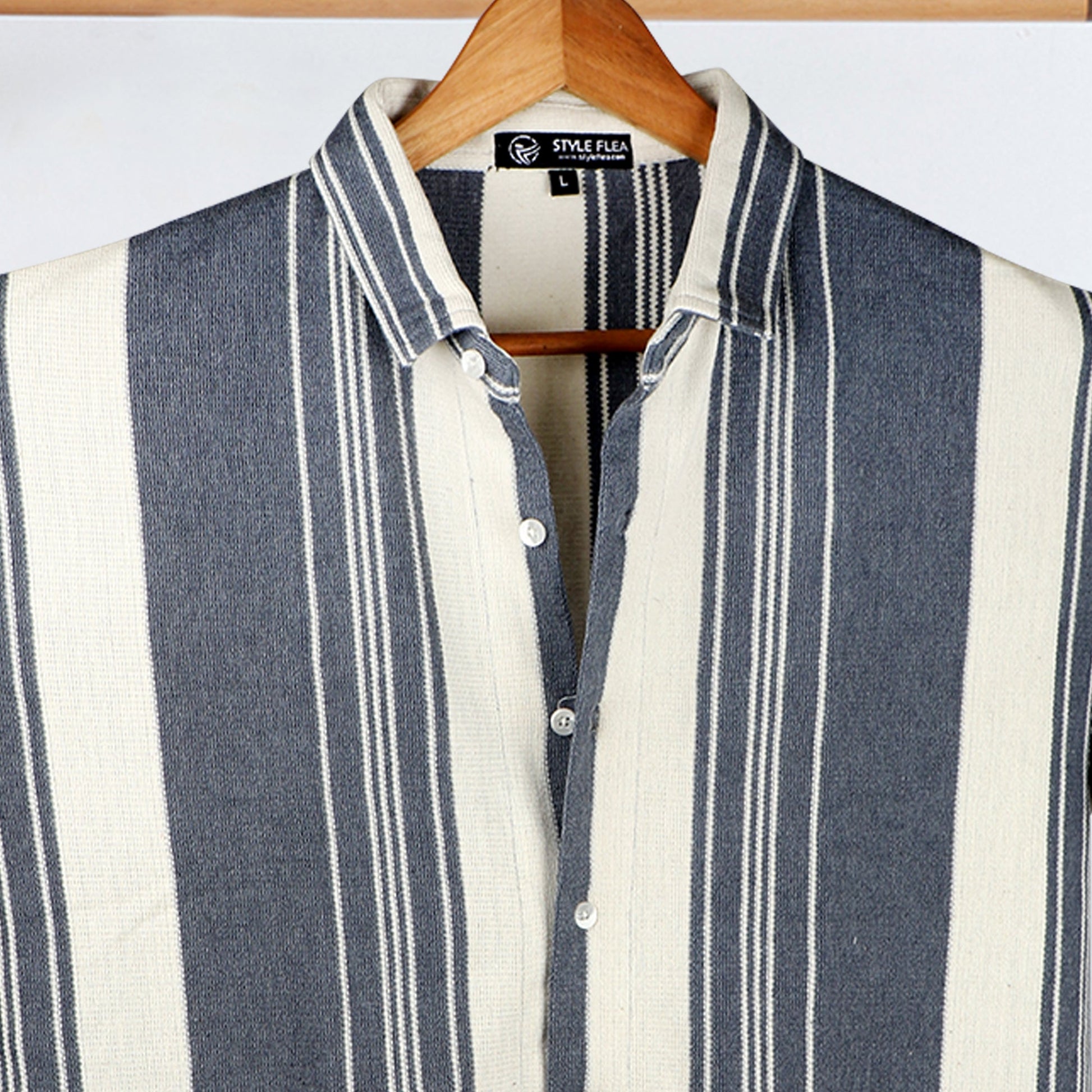 Close-up of Navy & Cream Striped Shirt, showcasing the jacquard knit texture