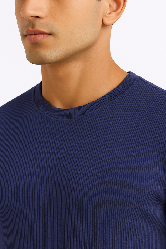 Close-up of a dark blue ribbed ultra stretch T-shirt highlighting the ribbed texture and crew neckline.