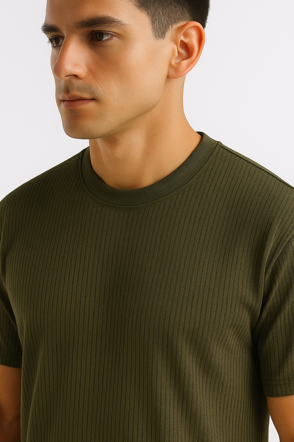 Close-up of an olive ribbed stretch T-shirt highlighting the ribbed texture and stretchable fabric.