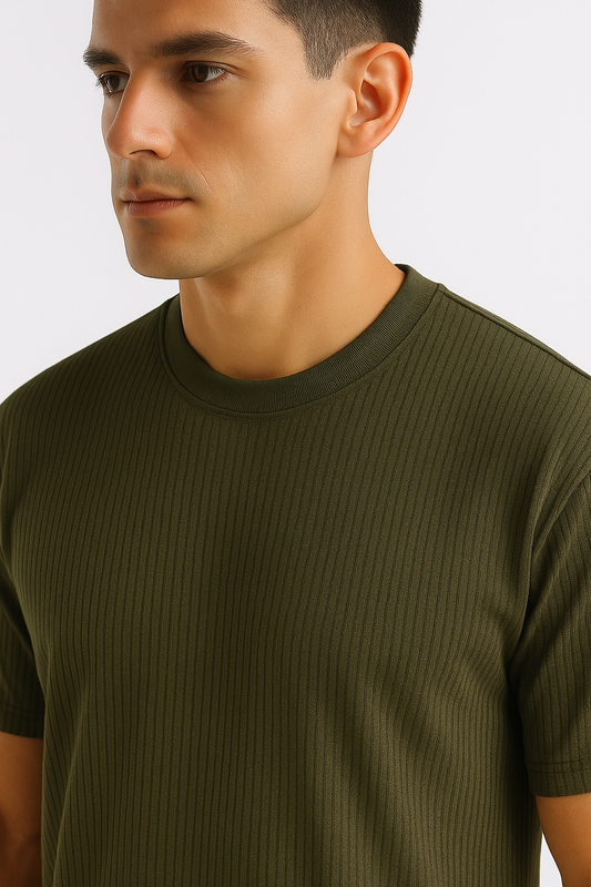 Close-up of an olive ribbed stretch T-shirt highlighting the ribbed texture and stretchable fabric.